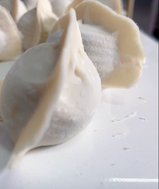 速凍餃子機(jī)做出來(lái)的餃子